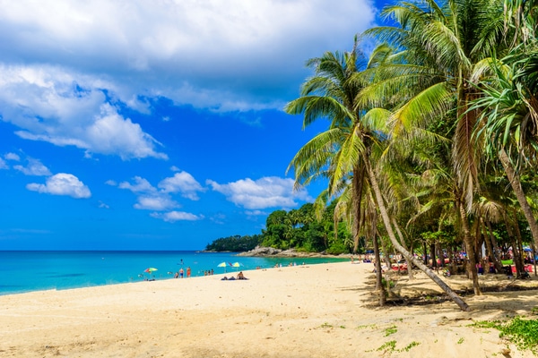 the view of the soft sand at paradise beach in phuket as seen from the shoreline