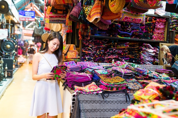 Asian female browsing in Thailand shops