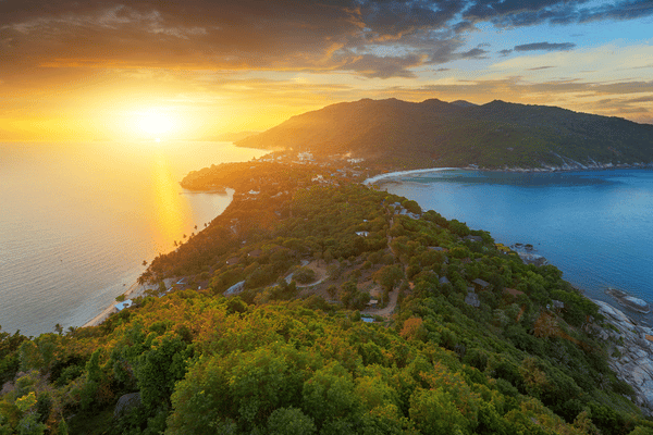 the idylic koh phangan island as seen at sunset from the nearby viewpoint