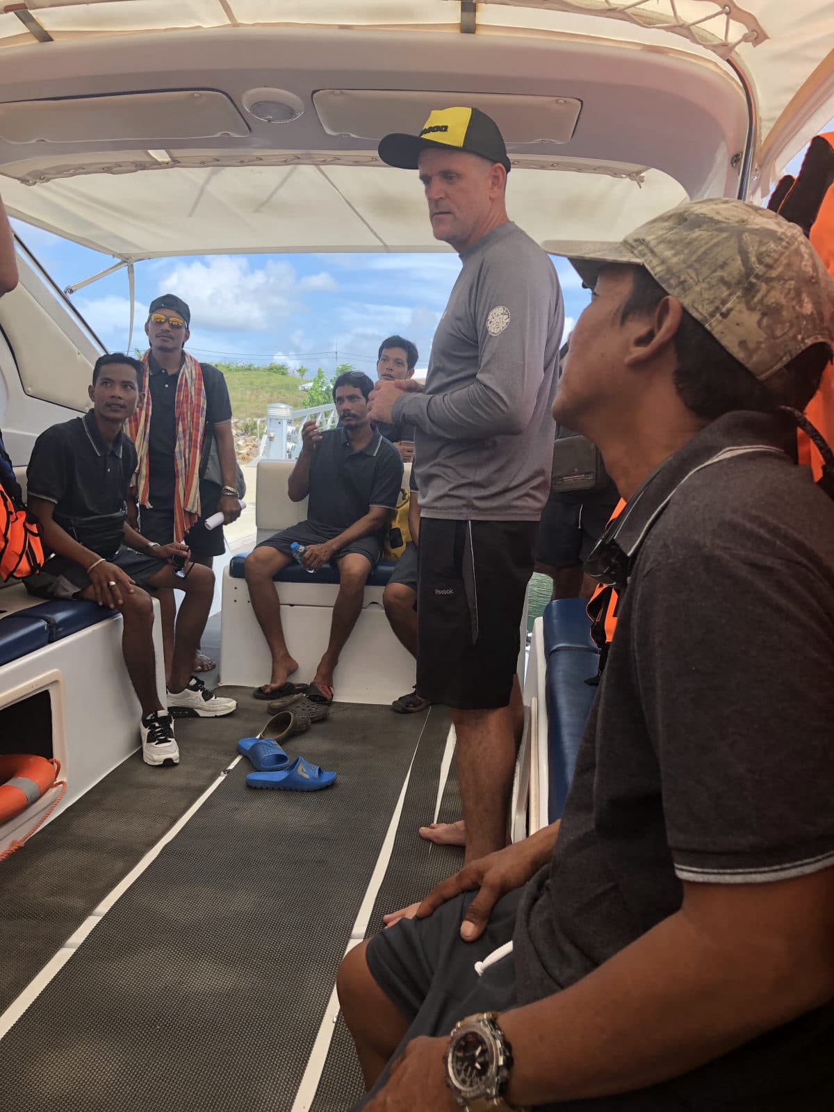 Captain Paul Chappell briefing crew aboard a Simba Sea Trips speedboat in the Andaman Sea