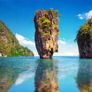 A stunning view of Phang Nga Bay, with limestone cliffs and sparkling waters.