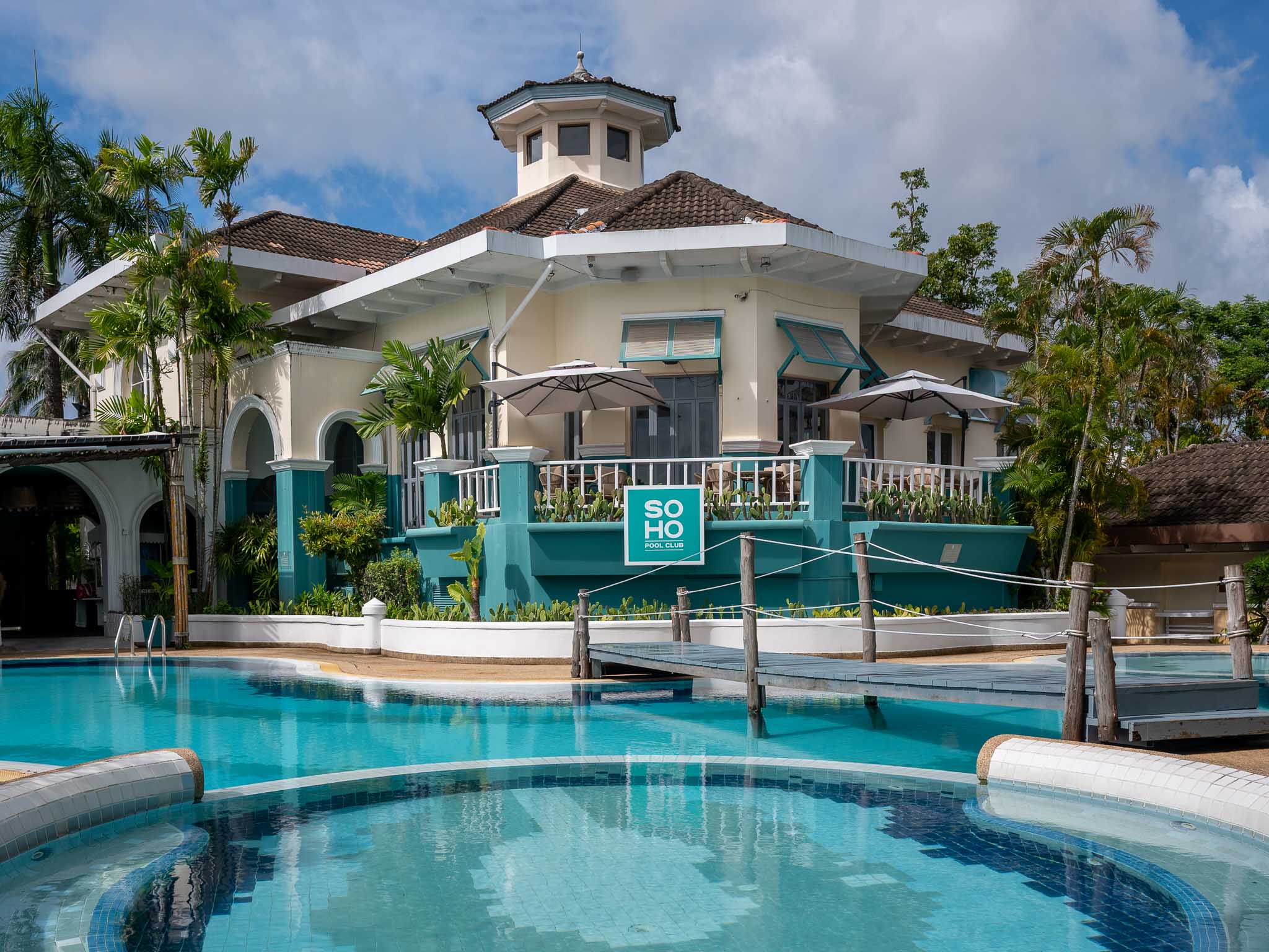 Soho Pool Club exterior and swimming pool at Boat Lagoon Marina Phuket