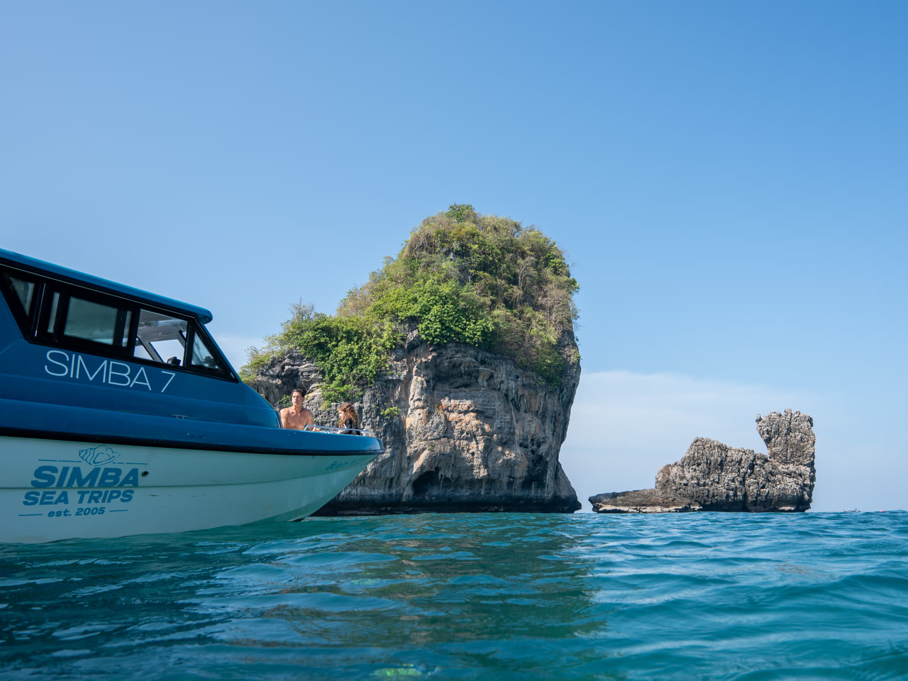 Guests on a Simba Sea Trips Phi Phi Sunrise tour enjoying a sunny day on the Andaman Sea