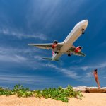 a plane arrives at phuket island