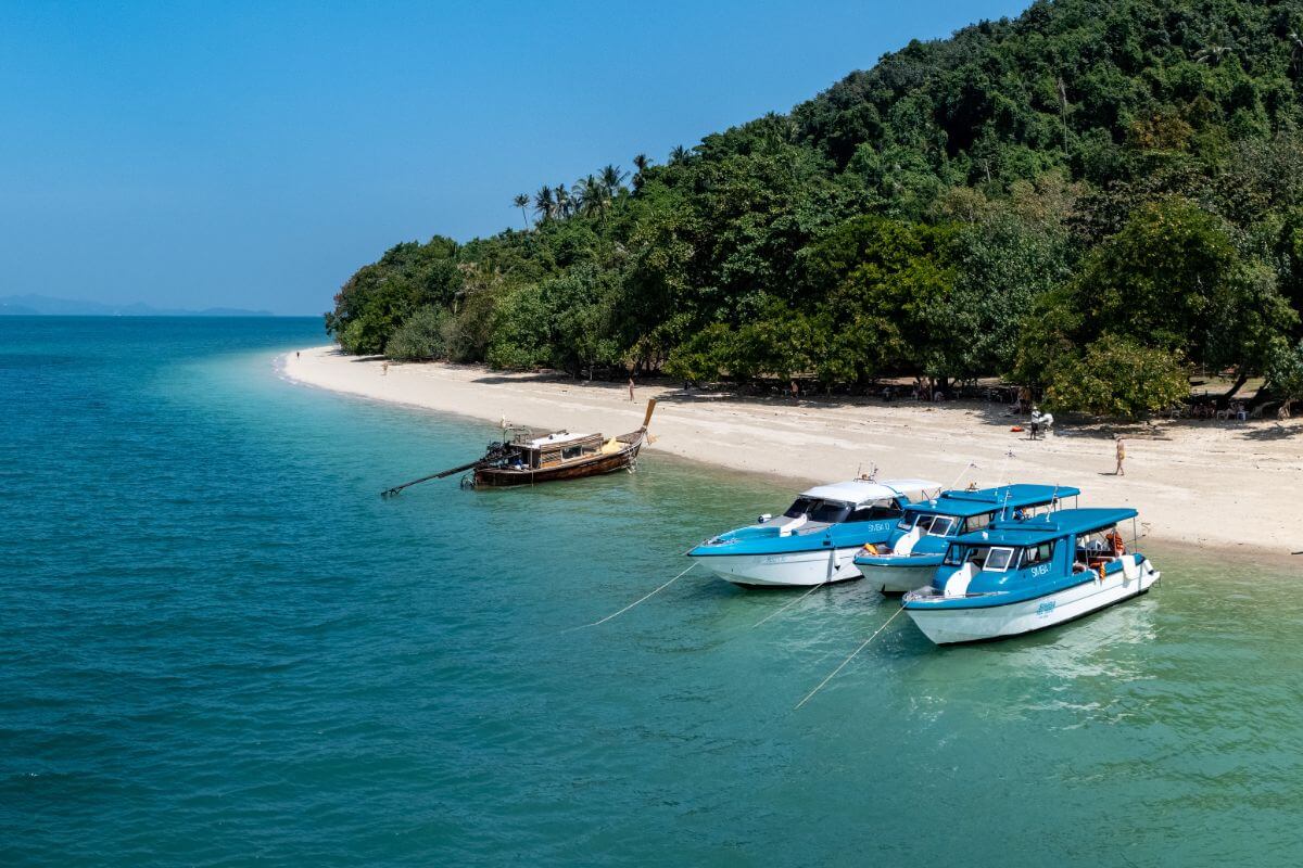 Phi Phi Private Boat Tour with boats anchored at Bamboo Island