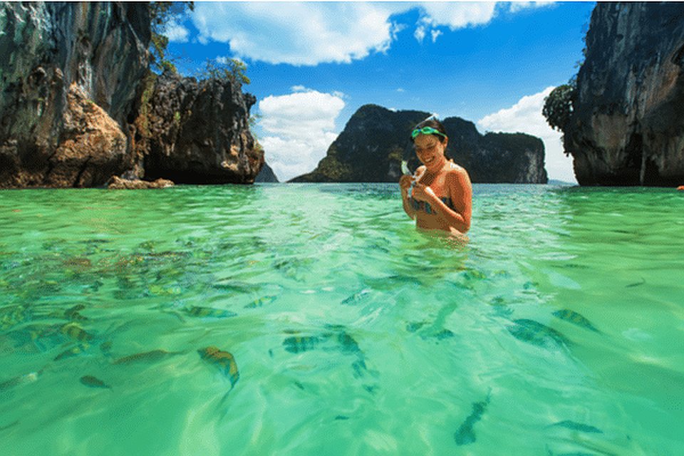 Snorkelling in clear water around the Phi Phi Islands